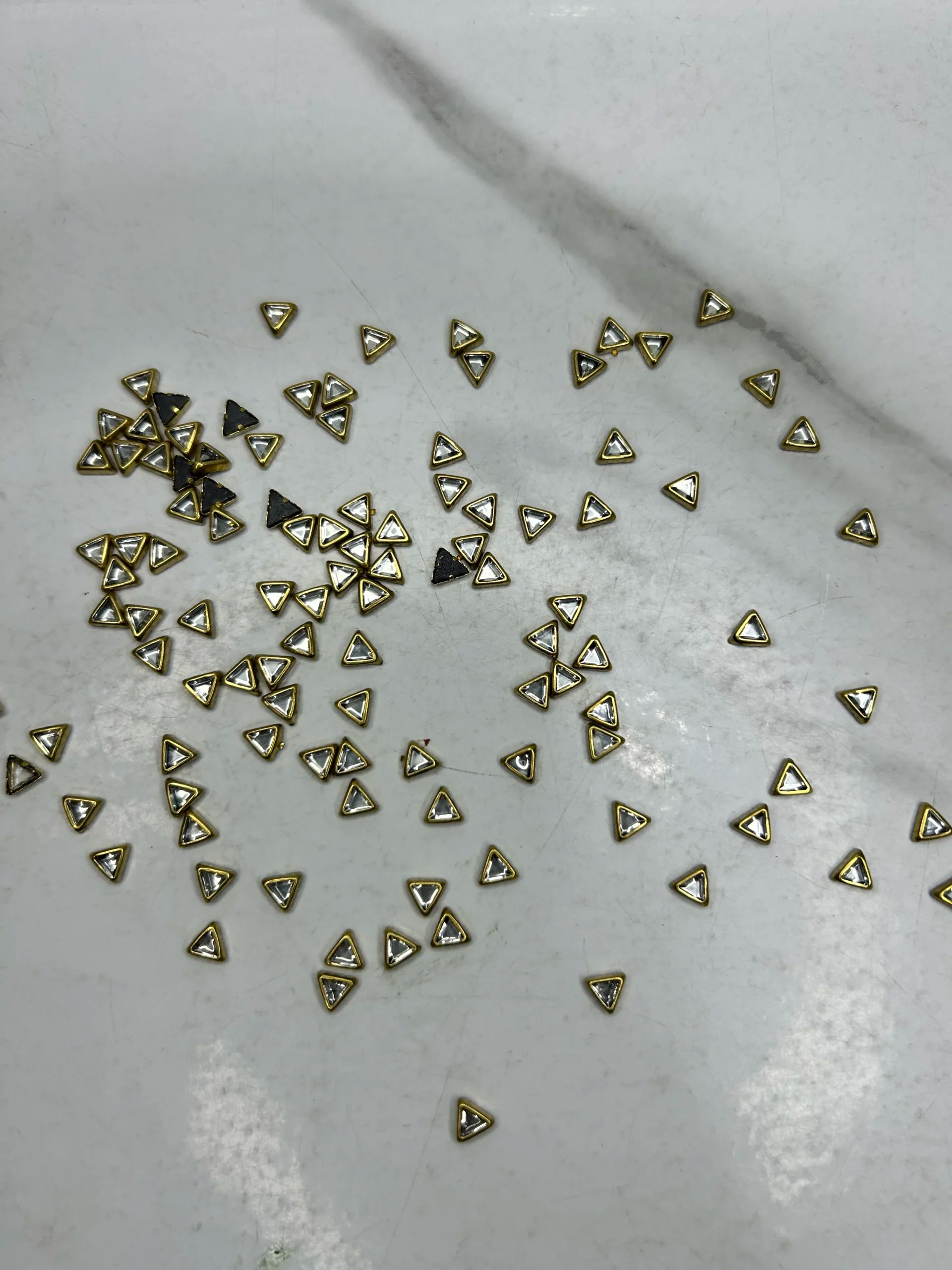 Tiny-Triangle Kundan (10G)