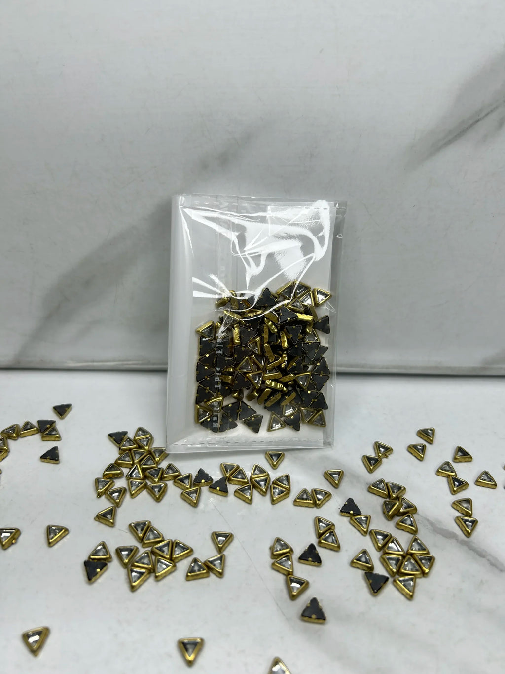 Tiny-Triangle Kundan (10G)