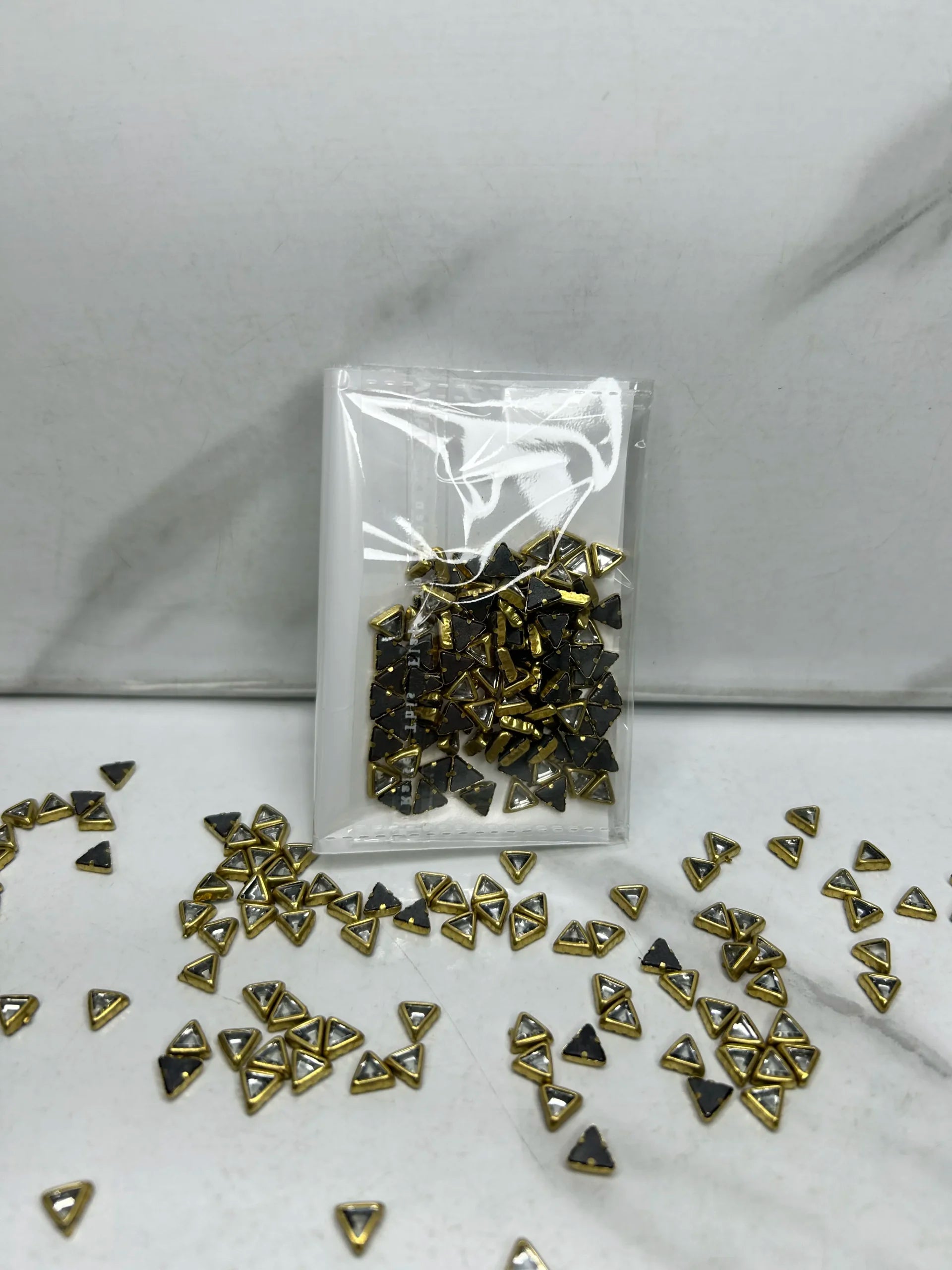 Tiny-Triangle Kundan (10G)