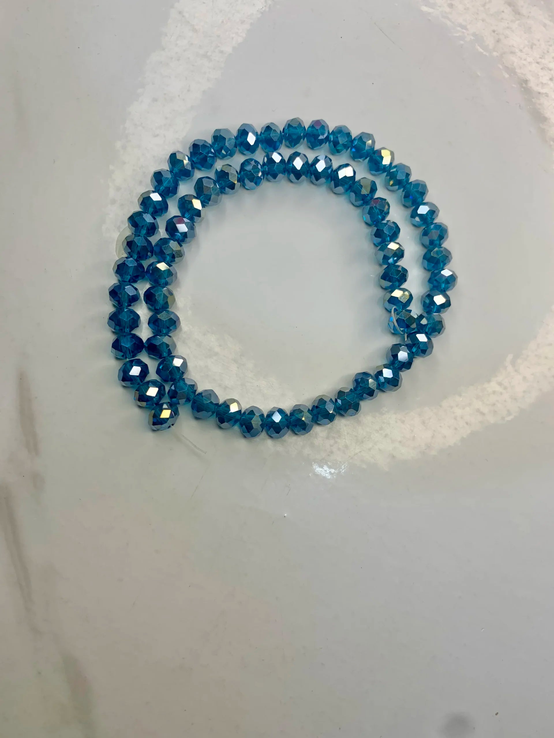 8mm- Aqua Blue Crystal (One-String)